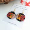 boricua round black food earrings with red flowers