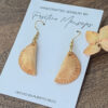 empanada earrings on wood