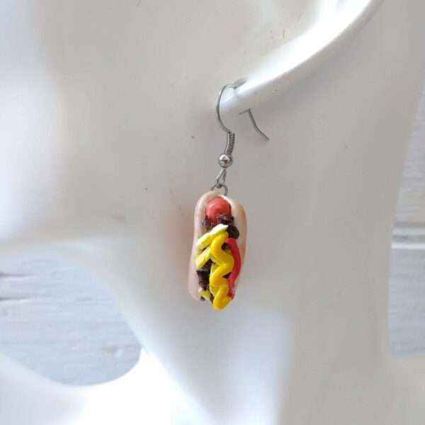 hot dog earrings on mannequin