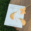 empanada earrings on jewelry card