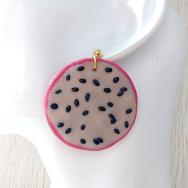 pitaya fruit earrings on ear