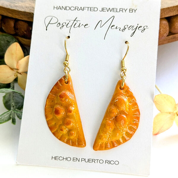 empanada yellows on jewelry card