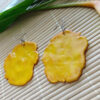 tostones de pana earrings side view