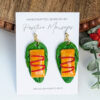 puerto rican pasteles earrings on round wood