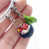 rice beans charm bracelet on fingers