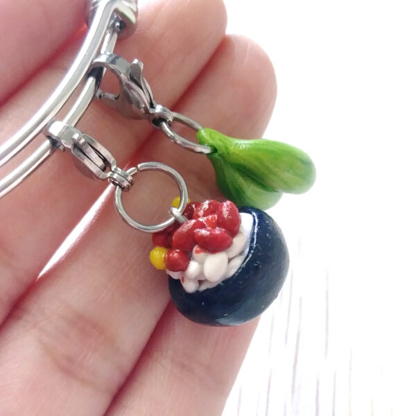 rice beans charm bracelet on fingers