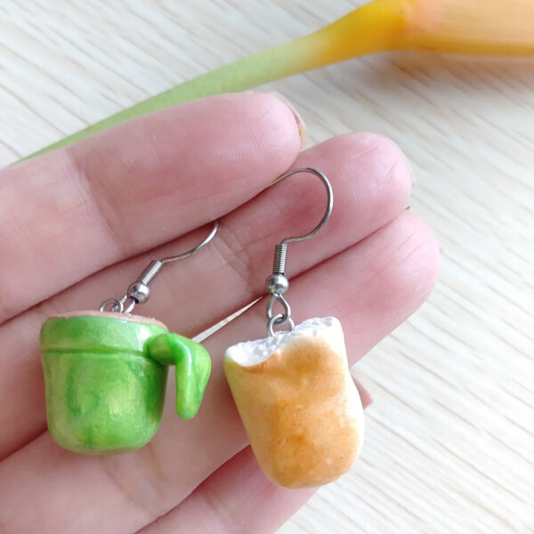 cafe con pan earrings on hand