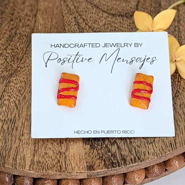 boricua pasteles stud earrings on wood