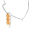 Puerto Rico long tostones earrings on ear