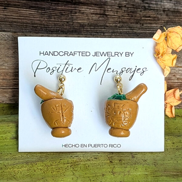 pilon earrings with taino coqui sun symbols