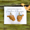 handmade pilon earrings on branch with flowers