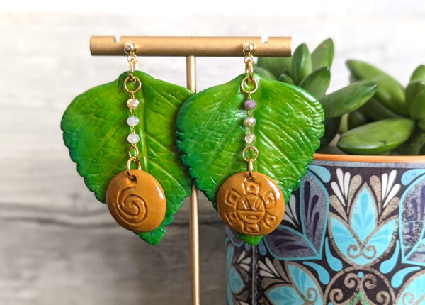 taino leaf earrings with symbols