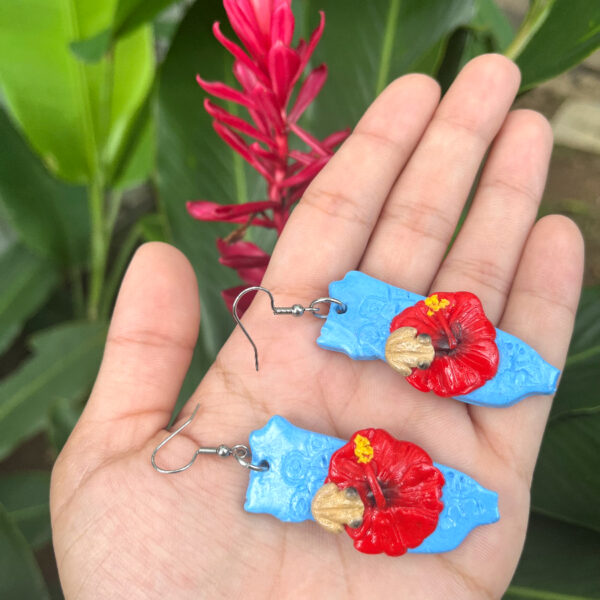 silver hook map earrings on hand