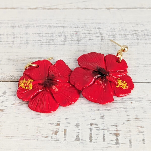 handmade hibiscus flower earrings side by side