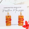 puerto rico pasteles earrings with ketchup