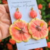 tropical pink yellow hibiscus earrings side view