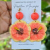 pink hibiscus flower earrings in nature