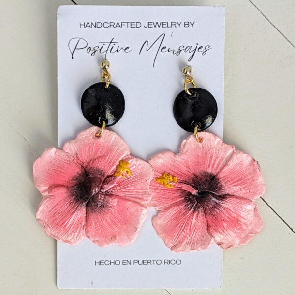 pink hibiscus flower earrings on jewelry card