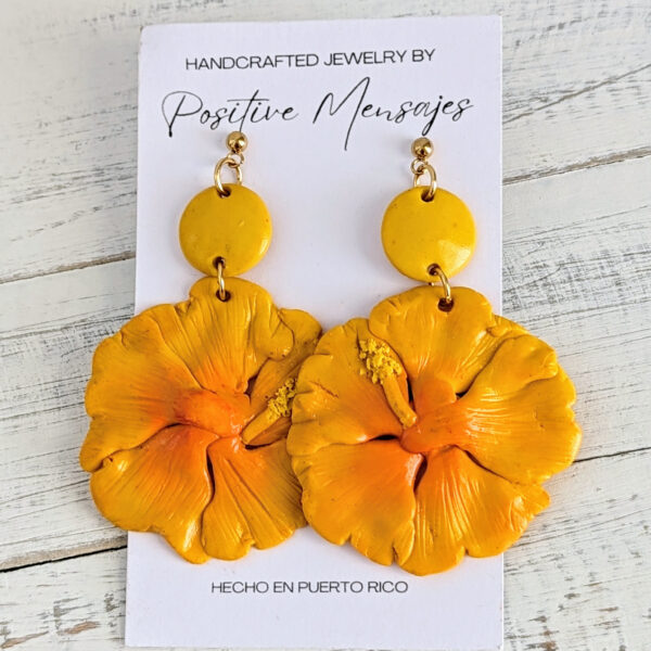 traditional Puerto Rico flower earrings on white board