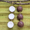 front back view of taino coconut earrings