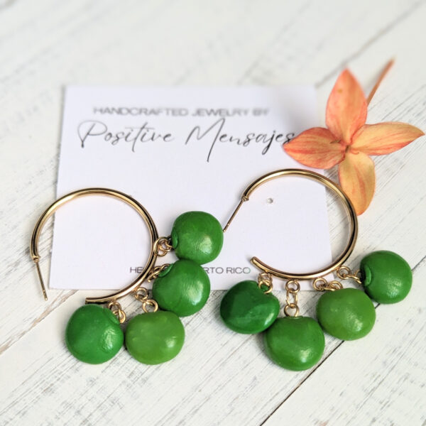 latina Gandules hoop earrings with flower