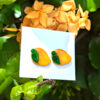 mango stud earrings on flowers