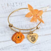 Boricua Tostones gold bracelet with orange flowers