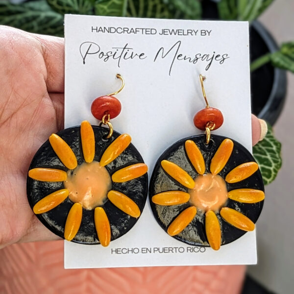 front view of sorullos sun earrings