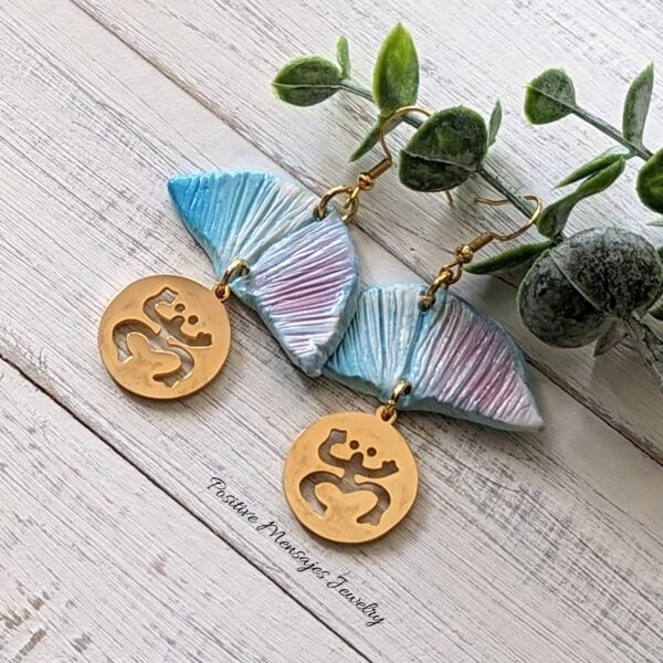 Coqui taino earrings by plant