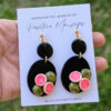 pink guayaba earrings in front of grass