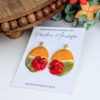 mamoncillo fruit earrings on jewelry card