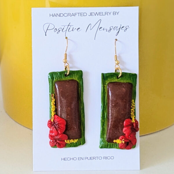 long pasteles art earrings in front of yellow vase