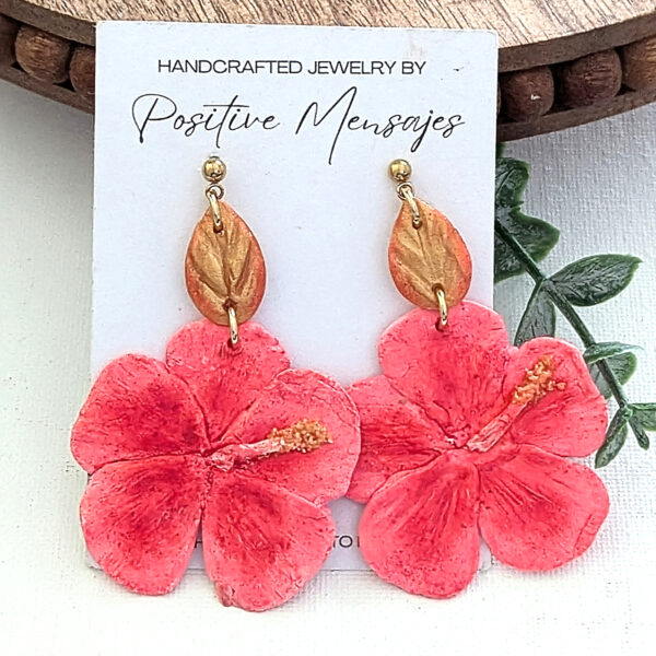 pink Flor de maga earrings on jewelry card
