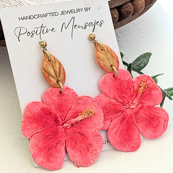 pink Flor de maga earrings on jewelry card