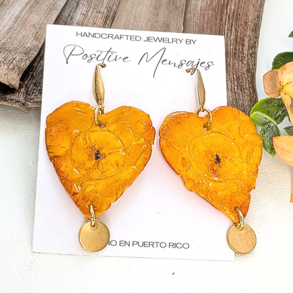 Heart Shaped Tostones Earrings With Round Pendant
