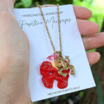 Taíno Coquí Symbol Necklace with Flamboyan Flower