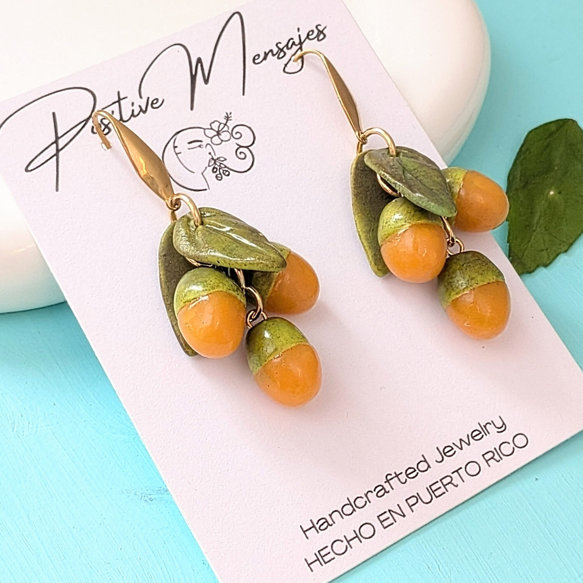 side view of quenepa jewelry