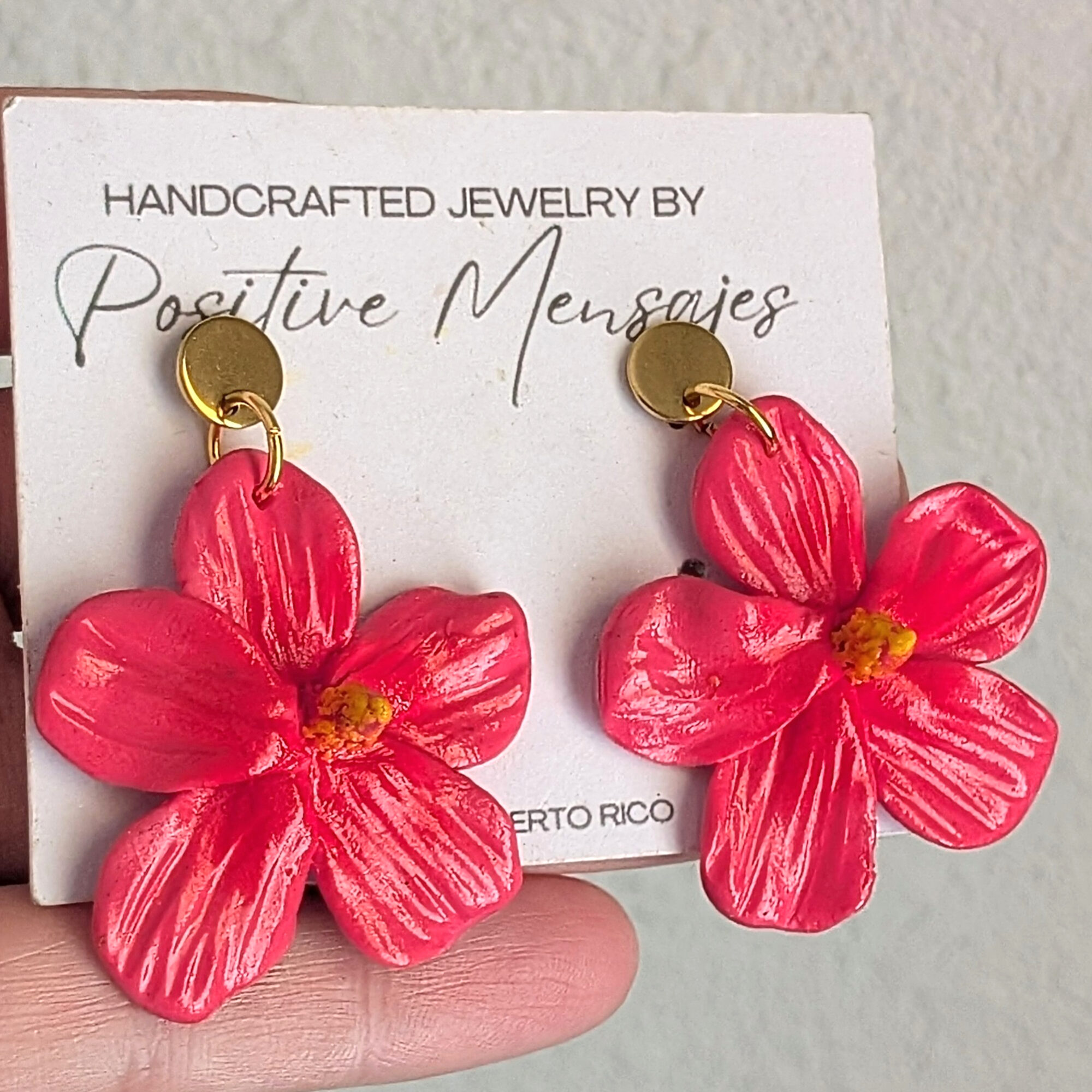 Flor de maga stud earrings on hand